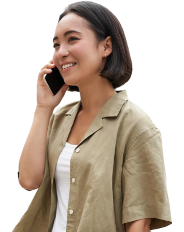 vertical-shot-young-asian-digital-nomad-girl-talks-mobile-phone-walks-street-with-lapto